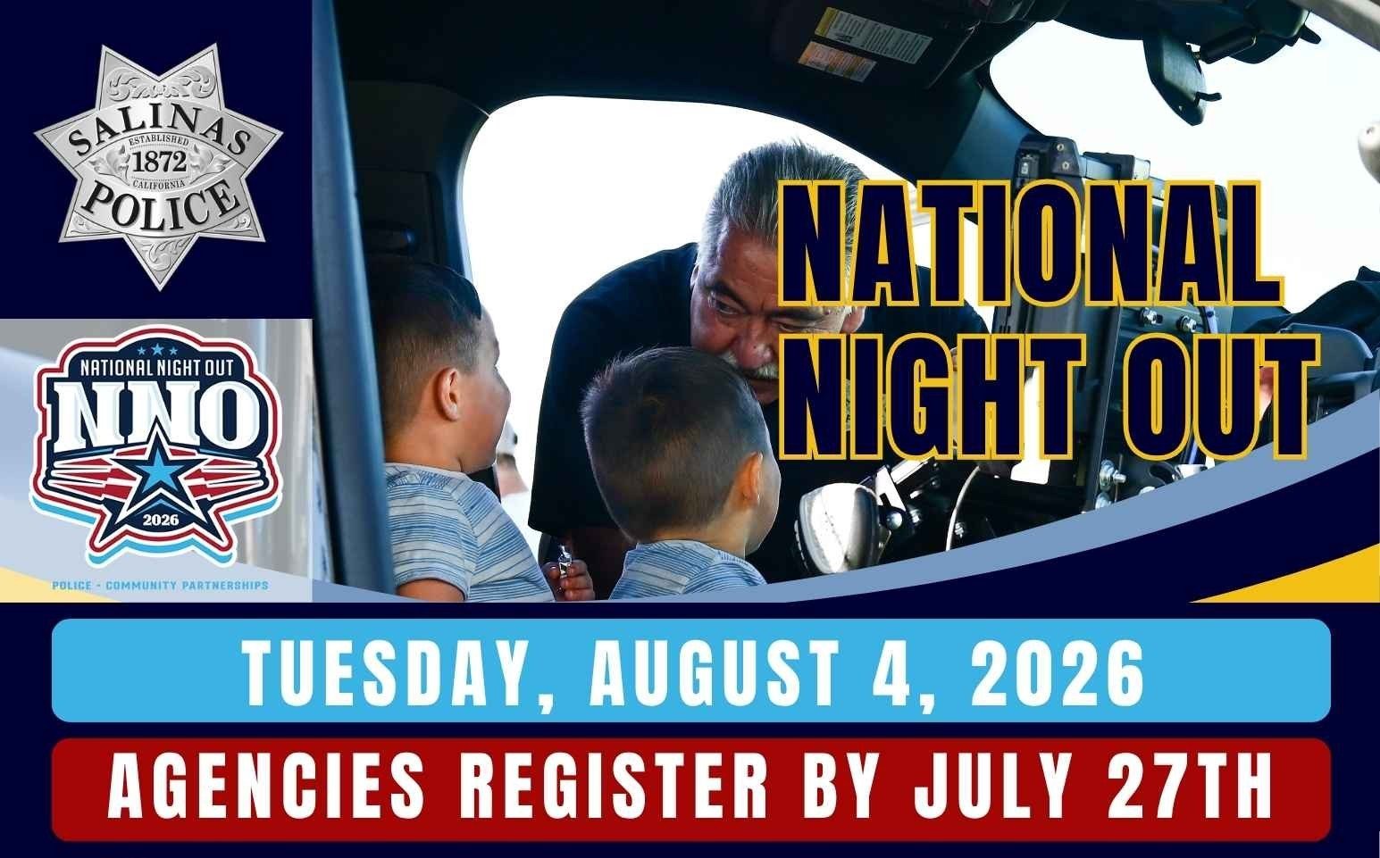 Officer with two kids sitting inside a Salinas Police patrol car at National Night Out.